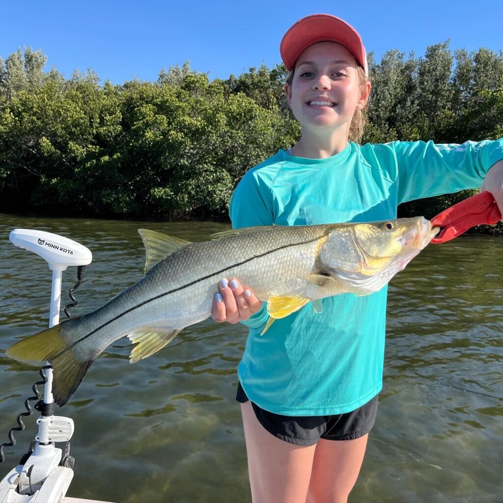 Young Woman with Snook Cape Coral Charter Fishing